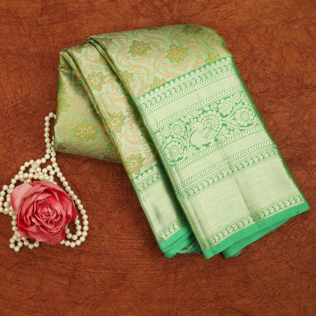 Green Tissue Kanjivaram Silk Saree With Floral Jaal Design