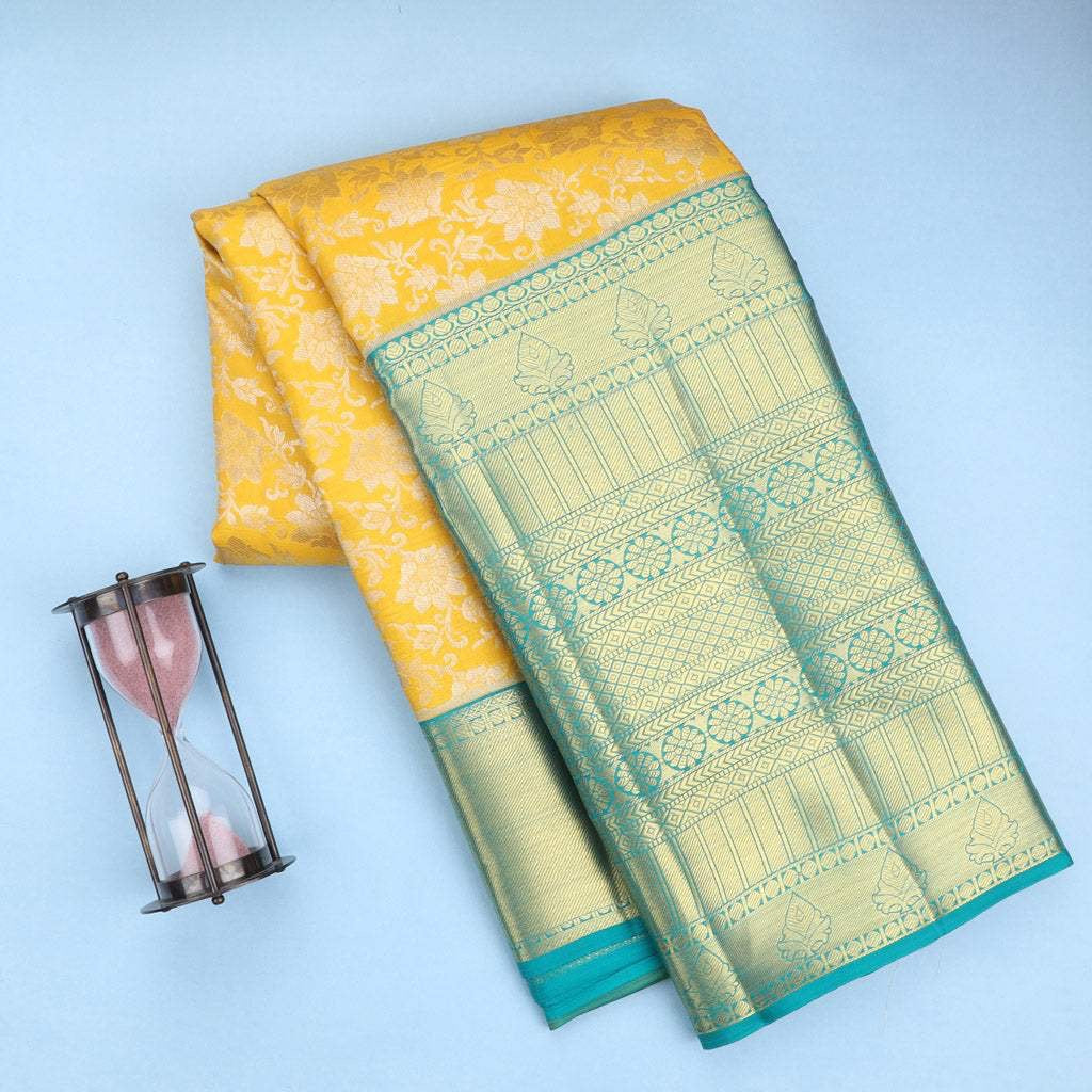 Bright Yellow Kanjivaram Silk Saree With Floral Pattern