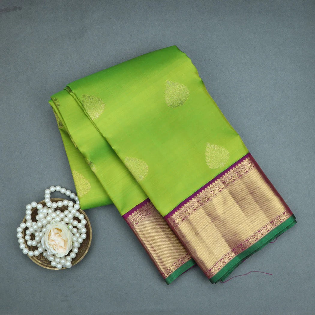 Lime Green Kanjivaram Silk Saree With Floral Buttas