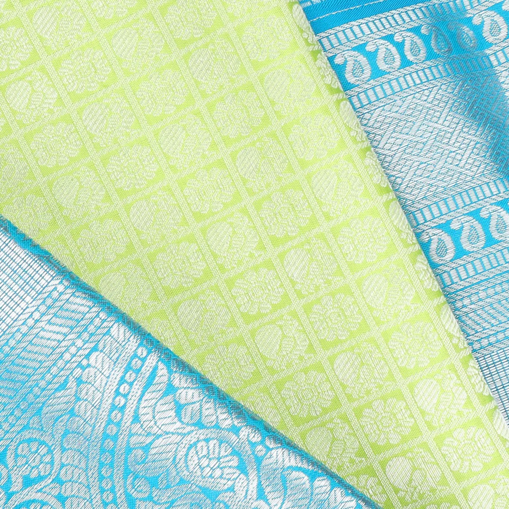 Light Green Kanjivaram Silk Saree With Floral Motifs